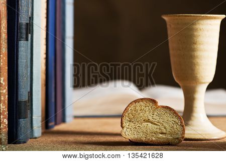 still life with chalice of wine and bible