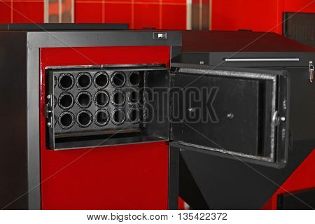 Solid-fuel boiler in the boiler room