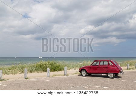 Tisvilde, Denmark - June 20, 2016: A Citroen 2cv Dyane standing on the parking lot of Tisvilde beach.