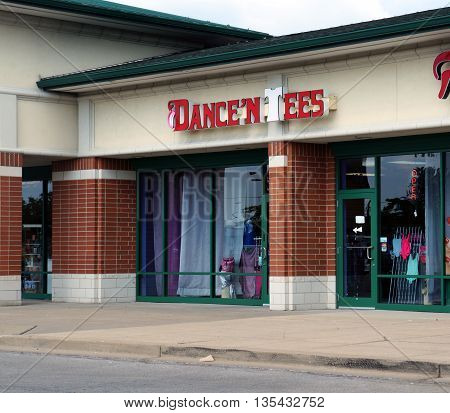 NAPERVILLE, ILLINOIS / UNITED STATES - JULY 23, 2015: One may dancing shoes and outfits at Dance 'N Tees, in a Naperville strip mall.