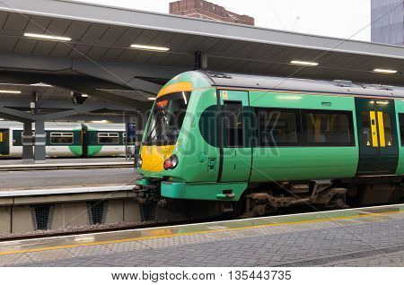 LONDON ENGLAND - OCTOBER 21: Trains at a platform on London Bridge station. In terms of passenger arrivals and departures it is the fourth-busiest station in London as well as the United Kingdom as a whole handling over 54 million customers a year.