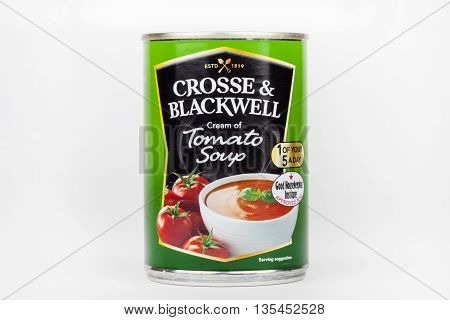 LONDON UK - JUNE 16TH 2016: A tin of Crosse and Blackwell Cream of Tomato Soup pictured over a plain white background on 16th June 2016.