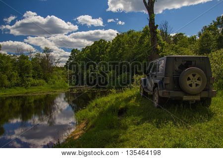 Novgorod region, Russia, June 18, 2016 , journey, Jeep Wrangler Novgorod region, Wrangler is a compact four wheel drive off road and sport utility vehicle