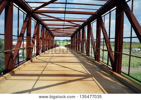 The IL 59 Ped/Bike Bridge allows pedestrians and cyclists safely to cross Highway 59 in Naperville, Illinois.