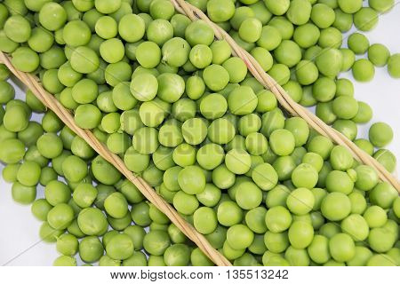 Beans of green peas isolated on white background