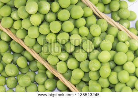Beans of green peas isolated on white background