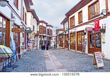 ANKARA TURKEY - JANUARY 16 2015: The scenic tourist neighborhood with renovated wooden cottages traditional stalls and workshops on January 16 in Ankara.