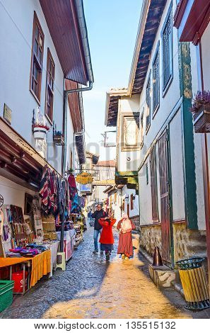 ANKARA TURKEY - JANUARY 16 2015: The narrow streets on the way to the Castle Hill are the best place for the souvenir stalls and local market on January 16 in Ankara.