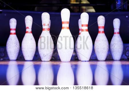 bowling pins ready to be felled on the track