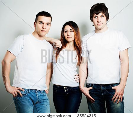 Youth. Young People Students Wearing White Empty T-Shirt. Two Guys and One Woman