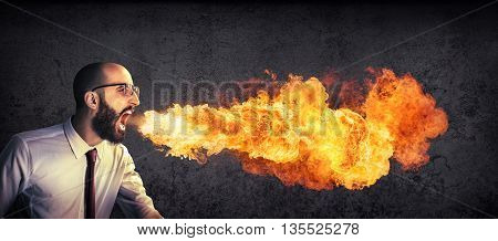 angry and furious announcement - businessman spitting fire