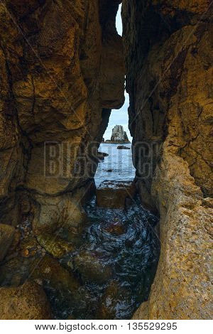 Seascape Through Slit In Rock.