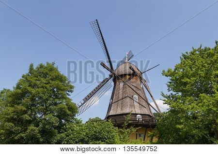 Brede, Denmark - June 23, 2016: The historic Fuglevad windmill in the Frilands Museum.