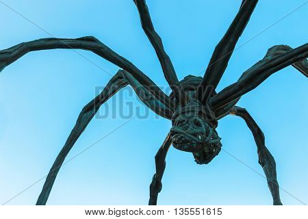 TOKYO JAPAN - NOVEMBER 28 2015: Maman - a spider sculpture by Louise Bourgeois situated at the base of Mori tower building in Roppongi Hills