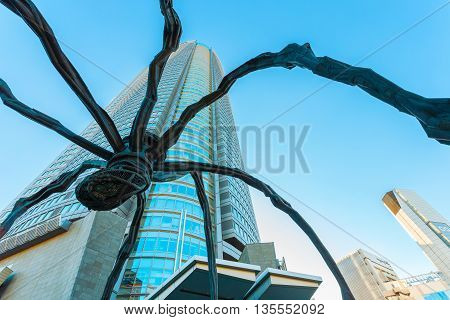 TOKYO JAPAN - NOVEMBER 28 2015: Maman - a spider sculpture by Louise Bourgeois situated at the base of Mori tower building in Roppongi Hills