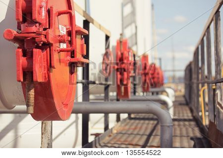 gas processing plant. Place in a large industrial boiler room.