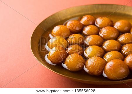 Gulab jamun, or gulaab jamun, is a milk-solids-based sweet mithai