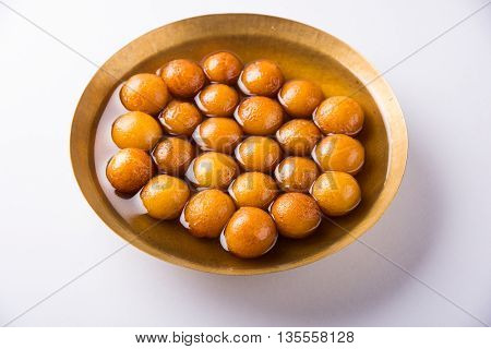 Gulab jamun, or gulaab jamun, is a milk-solids-based sweet mithai
