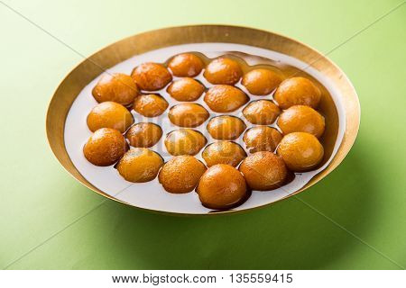 Gulab jamun, or gulaab jamun, is a milk-solids-based sweet mithai