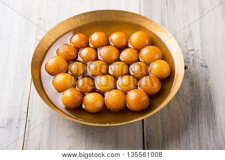 Gulab jamun, or gulaab jamun, is a milk-solids-based sweet mithai