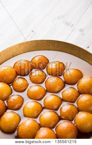 Gulab jamun, or gulaab jamun, is a milk-solids-based sweet mithai