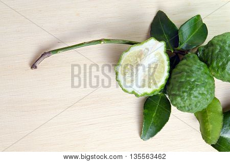 Bergamots (Other names are Kaffir lime Citrus Magnoliophyta Bergamot Rutaceae) fruits with green leaf