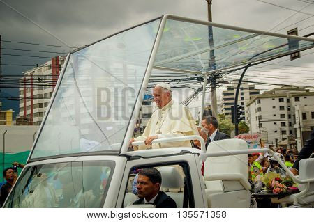 QUITO, ECUADOR - JULY 7, 2015: Pope Francisco in a popemobile, white dress, nice photo.