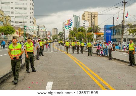 QUITO, ECUADOR - JULY 7, 2015: After Francisco pope passed trough the street, police control the street.