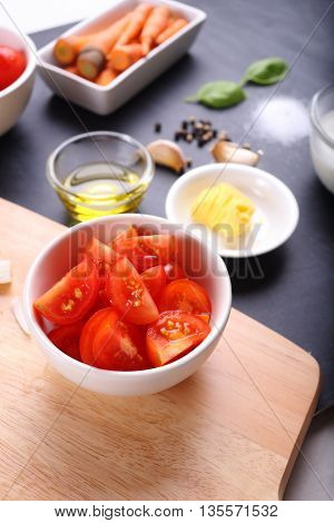 tomatoes slice in bowl for tomatoes soup ingredients