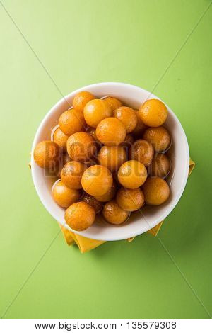Gulab jamun, or gulaab jamun, is a milk-solids-based sweet mithai