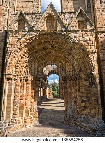 Arch in th ruins of Jedburgh Abbey in the Scottisch Borders region in Scotland