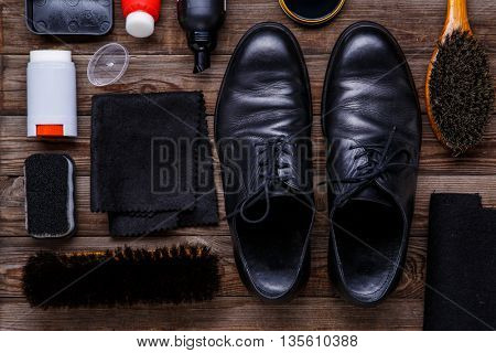 Shoe wax, brush and boot