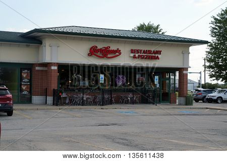 NAPERVILLE, ILLINOIS / UNITED STATES - JULY 23, 2015: Giordano's Restaurant & Pizzeria offers stuffed deep dish pizza and other Italian dishes in a Naperville strip mall.