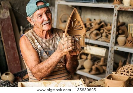 Trinidad Cuba - January 14 2016: Potter House or Casa del Alfarero run by Daniel Chichi Santander. Trinidad has a proud tradition of pottery and a local potter shows his craft and work