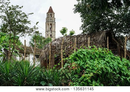 Valle de los Ingenios Trinidad Cuba - January 14 2016: Slave Tower Manaca Iznaga which is preserved from Cuba's past when slavery was legal. The tower is located in the Valle de los Ingenios and is today a major tourist attraction
