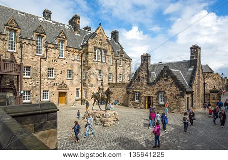 Edinburgh Scotland - July 28 2012: Visitors around the equestrian statue of the Field Marshal Earl Haig in the Edinburgh castle.