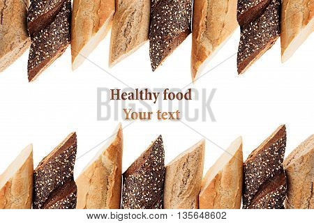 Cut baguette bread of different varieties on a white background. Rye wheat and whole grain bread. Isolated. Decorative frame of bread. Food background. Copy space.