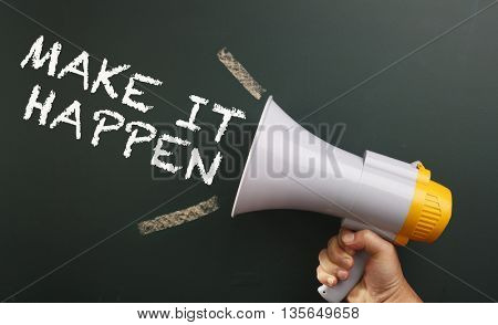 megaphone in front chalkboard with text make it happen