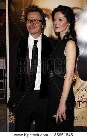 Alexandra Edenborough and Gary Oldman at the Los Angeles premiere of 'The Curious Case of Benjamin Button' held at the Mann Village Theater in Westwood, USA on December 8, 2008.
