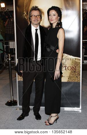 Alexandra Edenborough and Gary Oldman at the Los Angeles premiere of 'The Curious Case of Benjamin Button' held at the Mann Village Theater in Westwood, USA on December 8, 2008.