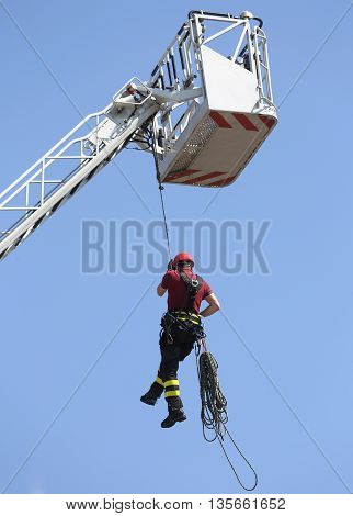 Firefighter Hung The Rope Climbing In The Firehouse