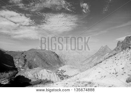 In Oman  The Old Mountain Gorge And Canyon The Deep Cloudy  Sky