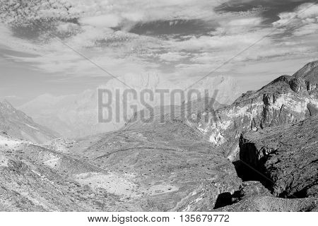 In Oman  The Old Mountain Gorge And Canyon The Deep Cloudy  Sky