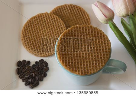 Coffee and soft toasted dutch waffles filled with caramel