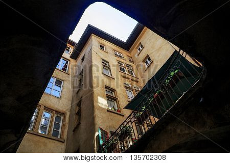 LYON, FRANCE - MAY 24, 2015: Traboule is a pedestrian passage through the quarter allowing to get from one street to another. It's view of inside the traboule's yard.