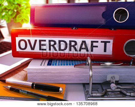 Red Office Folder with Inscription Overdraft on Office Desktop with Office Supplies and Modern Laptop. Overdraft Business Concept on Blurred Background. Overdraft - Toned Image. 3D.