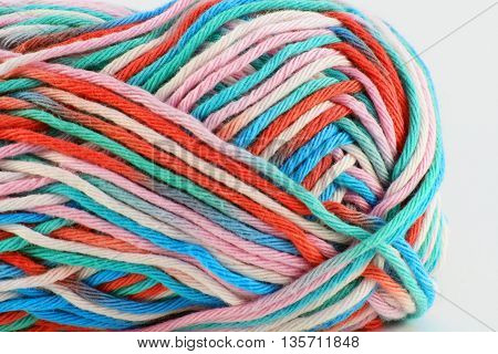 bale of wool in different colors with white background
