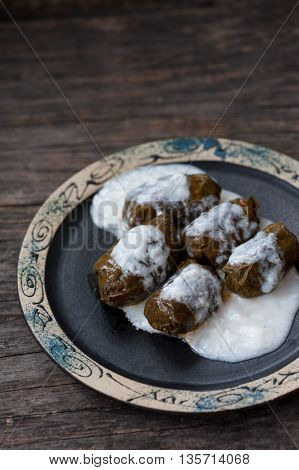 Romanian sarmale which are vine leaves stuffed with meat and rice