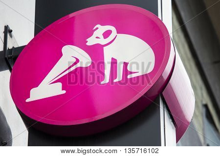 LONDON UK - APRIL 7TH 2016: A close-up of the HMV logo on the exterior of the HMV retail store on Oxford Street in London on 7th April 2016.