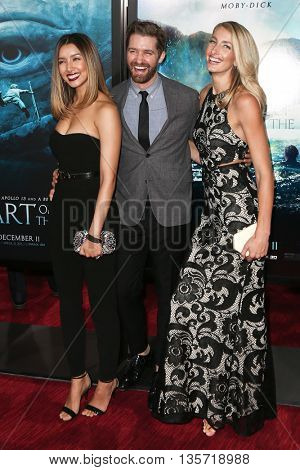 NEW YORK-DEC 7: (L-R) Renee Puente, Matthew Morrison and Marlett attend the New York premiere of 